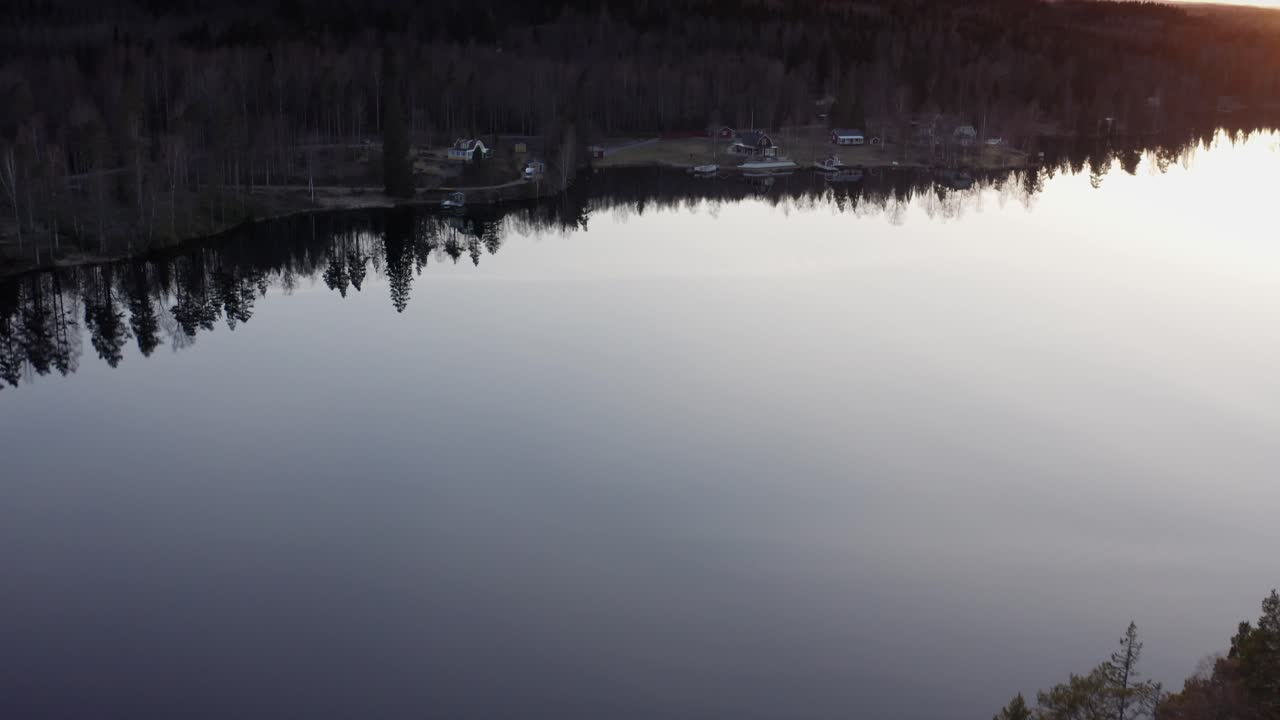Sunset Reflection on a Calm Lake