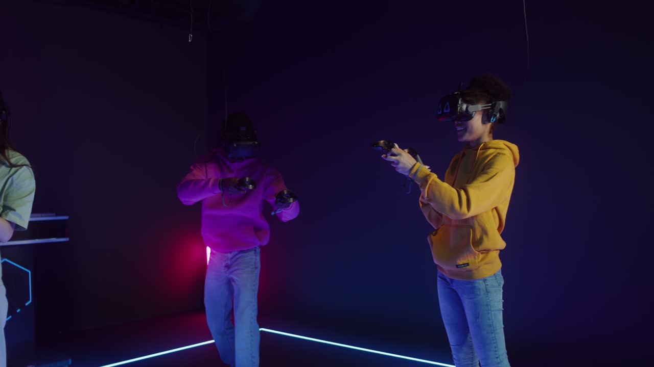 People playing games with VR headsets