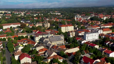 drone shot of buildings and city streets of keszthely in hungary