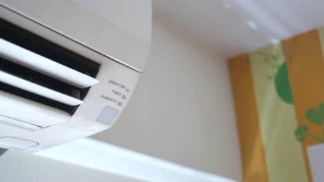 close-up of an air conditioner unit on a ceiling