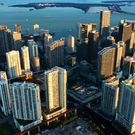 beautiful skyscrapers in the downtown of miami in the rays of sun. scenic view the city on the shore of the atlantic ocean from top perspective.