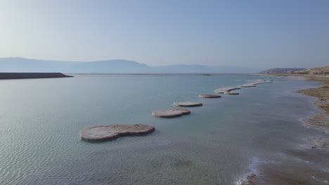 the round salt mushrooms formed in the dead sea at sunrise