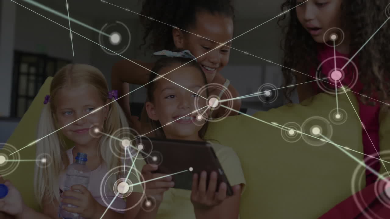 Using tablet with network connections animation overlay, children in school learning