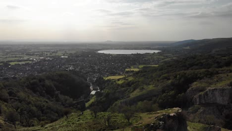 Scenic-Aerial-View-From-Cheddar-Gorge-With-Village-And-Reservoir-In-Distance