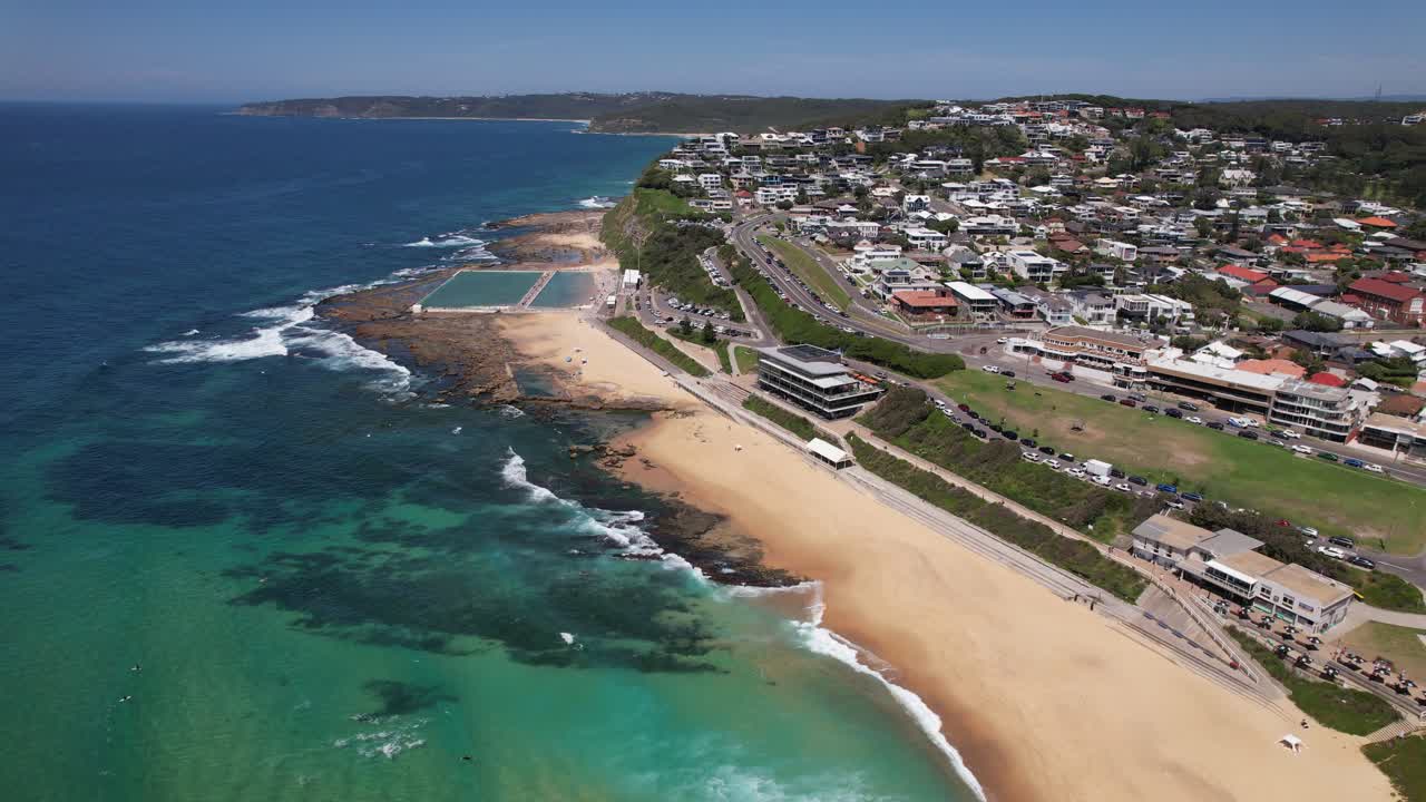 Merewether Ocean Baths With Beach In New South Wales, Australia - Aerial Pullback