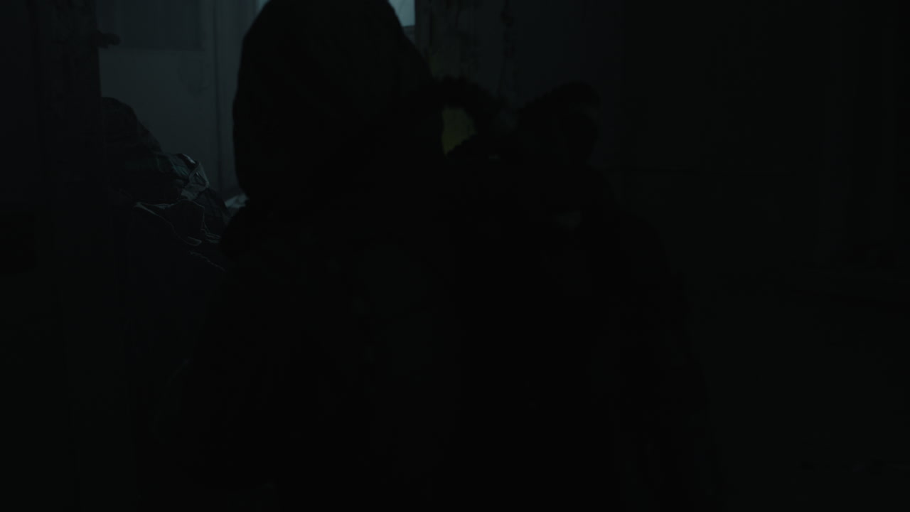 Military personnel in dark, dangerous environment