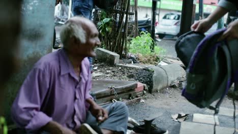 a cobbler repairing slippers of pilgrims by the roadside in the morning stock footage collection 16