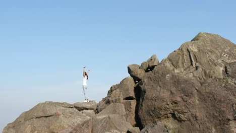 Rear-view-of-woman-on-the-top-of-the-hill