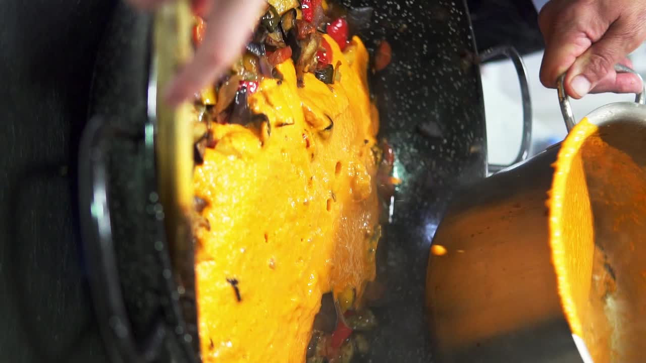 Vertical shot of Spanish food being cooked