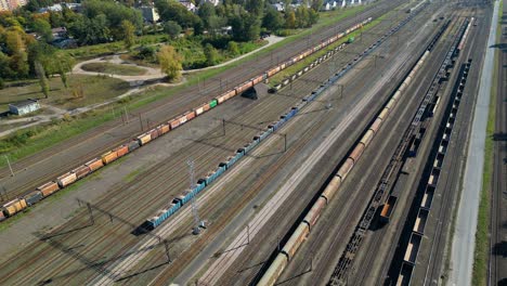 Aerial-view-of-shipping-containers,-semi-trucks-cargo-distribution-of-containers