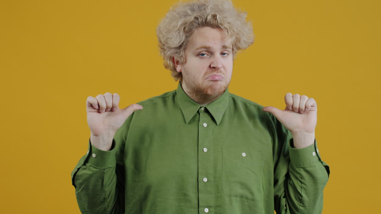 Man Expressing Uncertainty or Discomfort