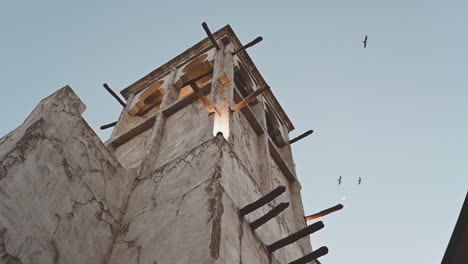 traditional wind tower on an old house in the historical neighborhood of al fahidi, dubai, united arab emirates