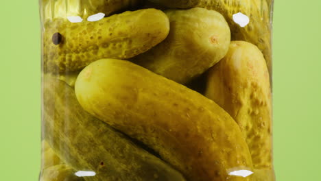 pickled cucumbers in a jar