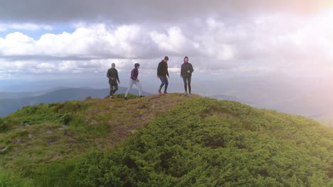 the flight near four friends walking up the mountain