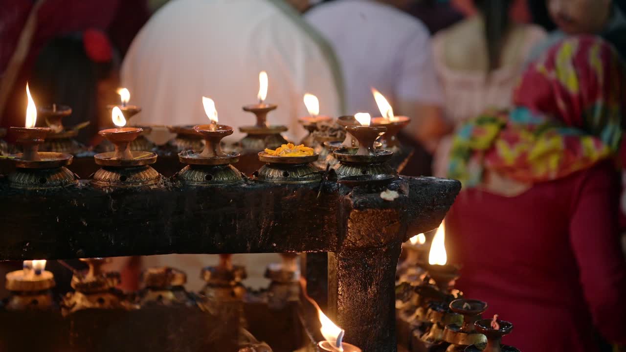 Prayer Candles at a Hindu Temple in Nepal, Religious Site Architectural Details of Burning Candles in Durbar Square in Kathmandu Old Historic City Centre, a Popular Tourist Landmark