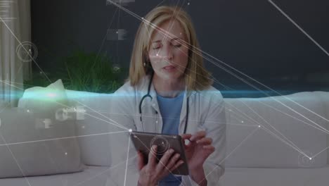 animation of network of connections and data processing over caucasian female doctor using tablet