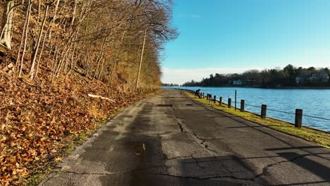 pulling backward and revealing more of the former road, now an exercise path