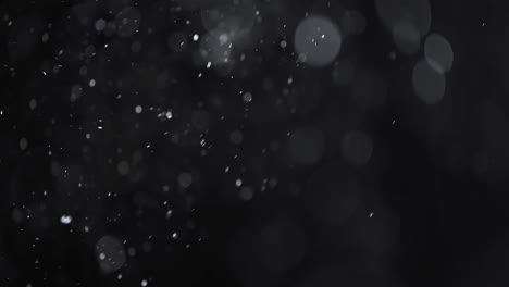 bokeh de partículas abstractas flotantes sobre fondo oscuro
