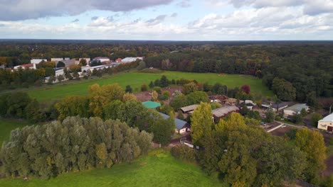 beautiful aerial view flight of horse farm paddock in brandenburg havelland germany at summer day 2022