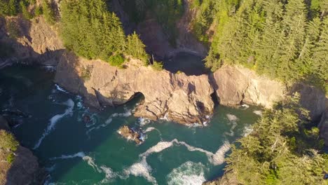 oregon coast highway 101 viewpoint of "natural bridge," oceanside rock arch formations in mountain