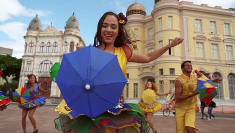 frevo dancers at the street carnival in recife, pernambuco, brazil.