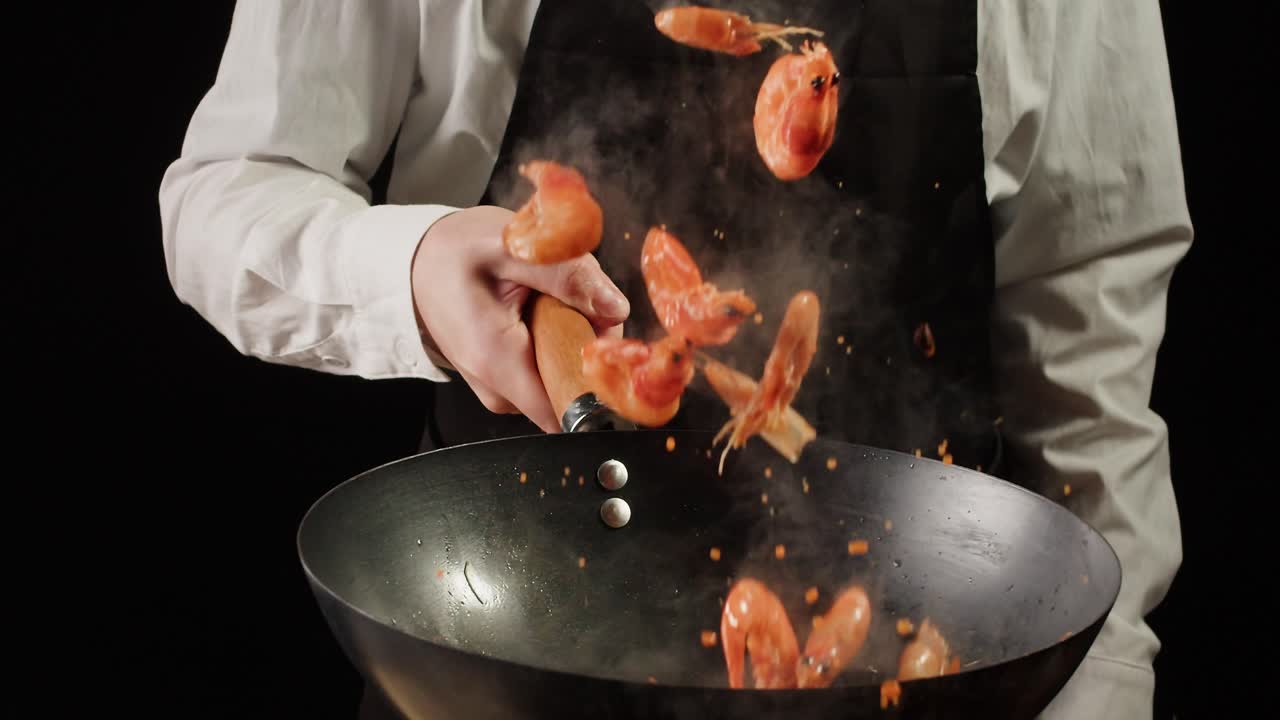 Chef Cooking Shrimp in a Wok