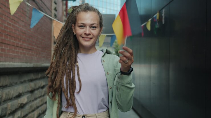 Woman with German Flag in Urban Setting