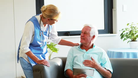 a nurse visiting a senior patient