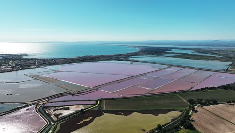 Sky-high-perspective-of-the-rosy-salt-labyrinths-in-Aigues-Mortes'-Salin-du-Midi