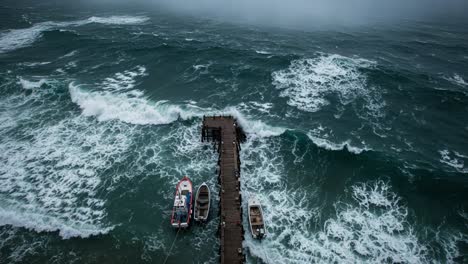 a dramatic perspective of a pier surrounded by turbulent ocean waves capturing the power of nature in a stormy atmosphere