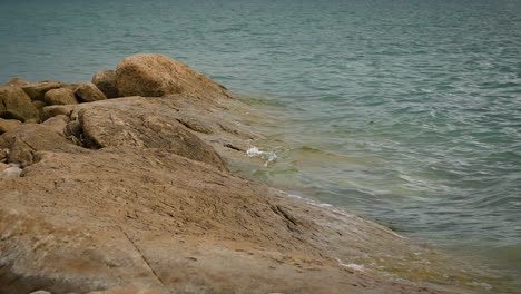 Waves-Hitting-The-Rocks-On-The-Lakeshore