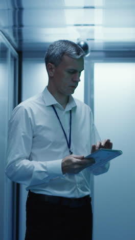 business professional in a server room