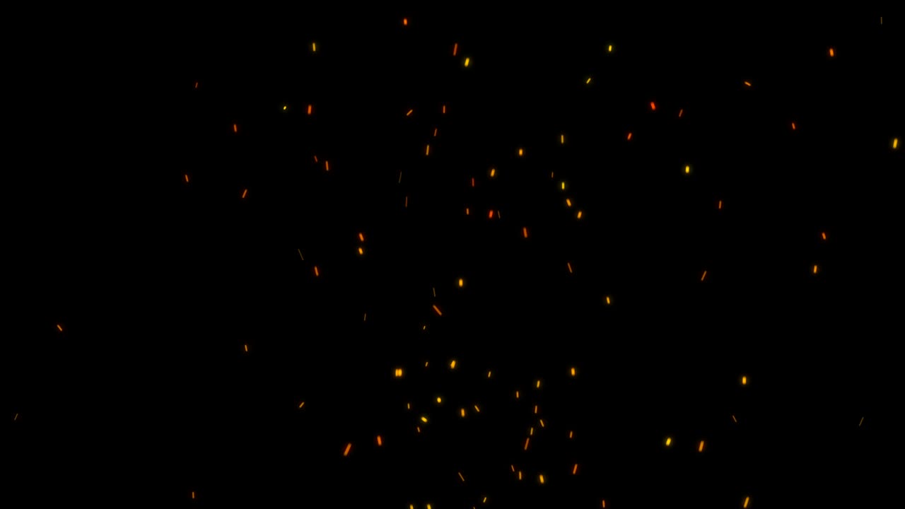 chispas calientes que surgen de un fuego.