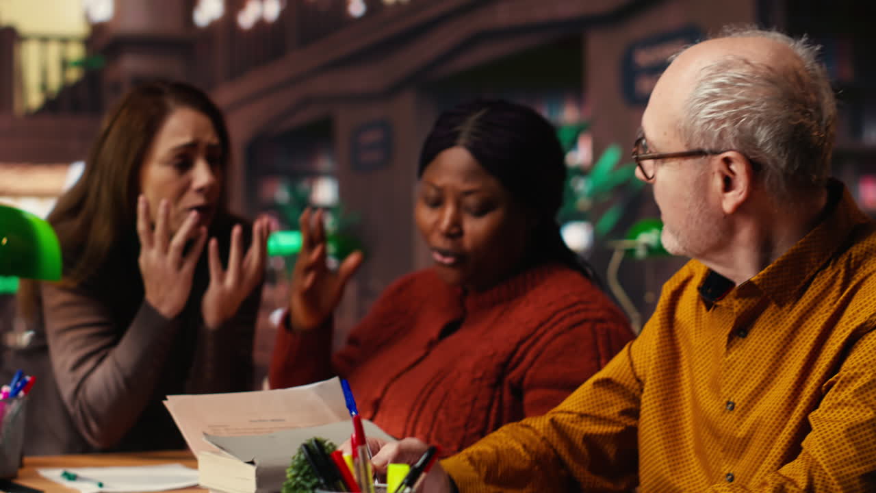 People Meeting in a Library