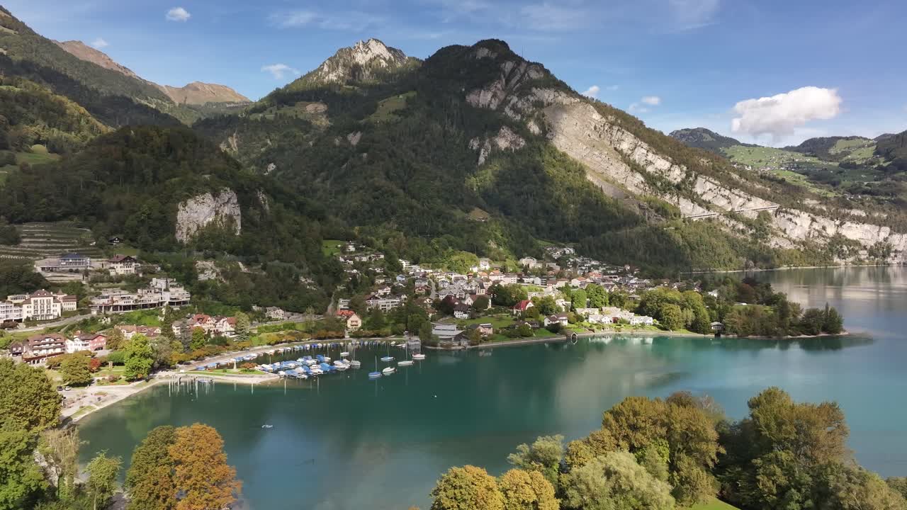 Stunning Aerial View of a Lakeside Village in the Swiss Alps