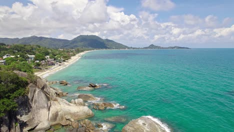 Beautiful-4K-drone-footage-of-the-beach-and-unique-rock-features-at-Hin-Ta-Hin-Yai-Beach-on-Koh-Samui-in-Thailand