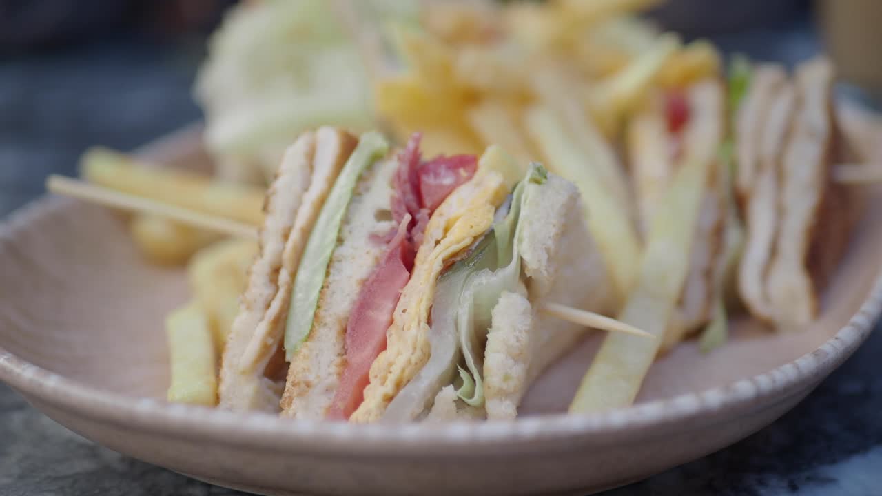 Club sandwich with fries