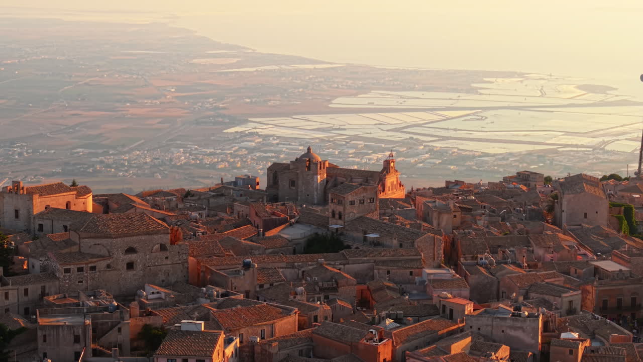 Erice Village On Mount Erice With Tyrrhenian Sea In The Background At Sunset In Sicily, Italy. - aerial ascend shot