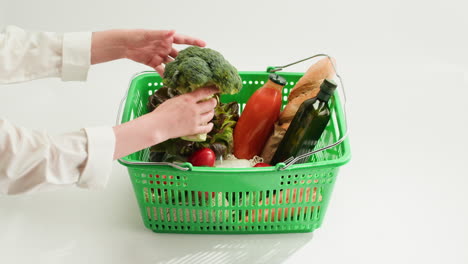woman shopping basket with produce