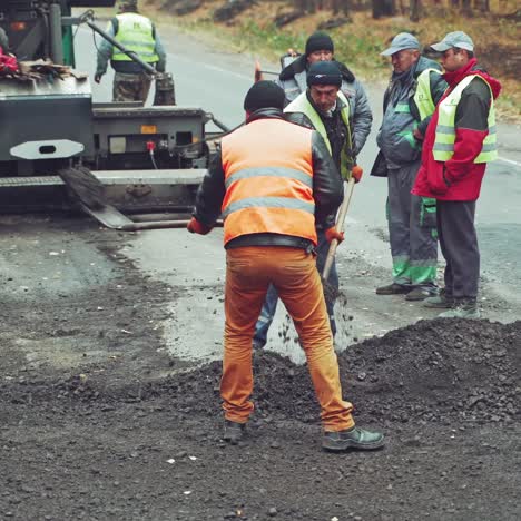 workers on road construction