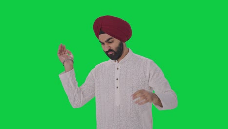 frustrated sikh indian man flying a mosquito green screen