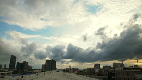 silhouette of condominium and house in front of sky cloud moving and natural daylight