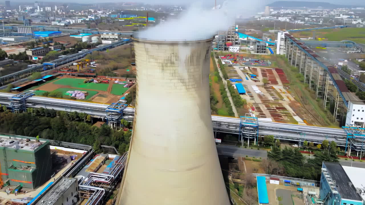 Sunrise Chemical plant exhaust gas oil emissions, Power plant in the city. Industrial chimneys from factory Metallurgy blue sky Metallurgical industrial factory. Poisoned air Epic pollution of nature.