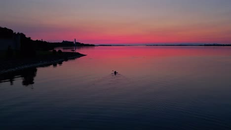 red  glow morning  kayaking into the sunrise