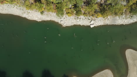 above view of pristine water in eagle hollow cave in arkansas, usa