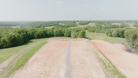 open field with stalls and targets