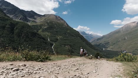 hikers in mountain valley