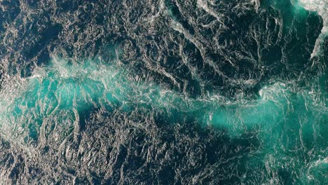 Blue-waves-of-water-of-the-river-and-the-sea-meet-each-other-during-high-tide-and-low-tide.