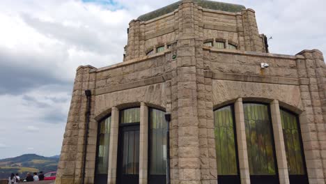 4k circling counter clockwise around the vista house on historic columbia river highway with mostly cloudy sky take four