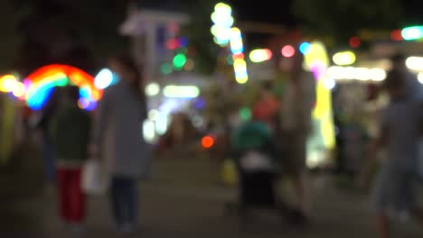 people walking in the night street.